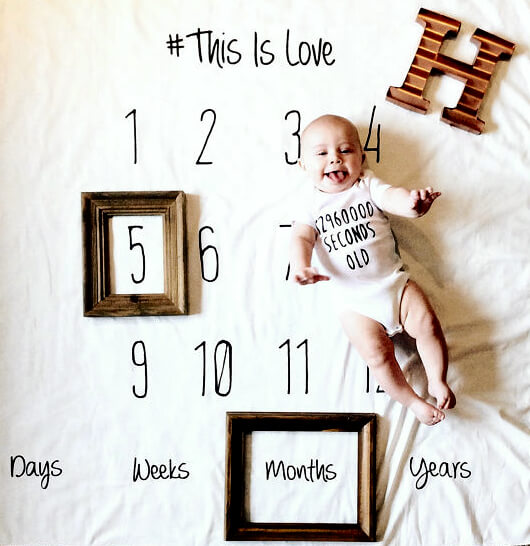 5 Unique And Easy Ideas For Your Baby S Monthly Milestone Photos That Go Beyond The Onesie Sticker What Moms Love