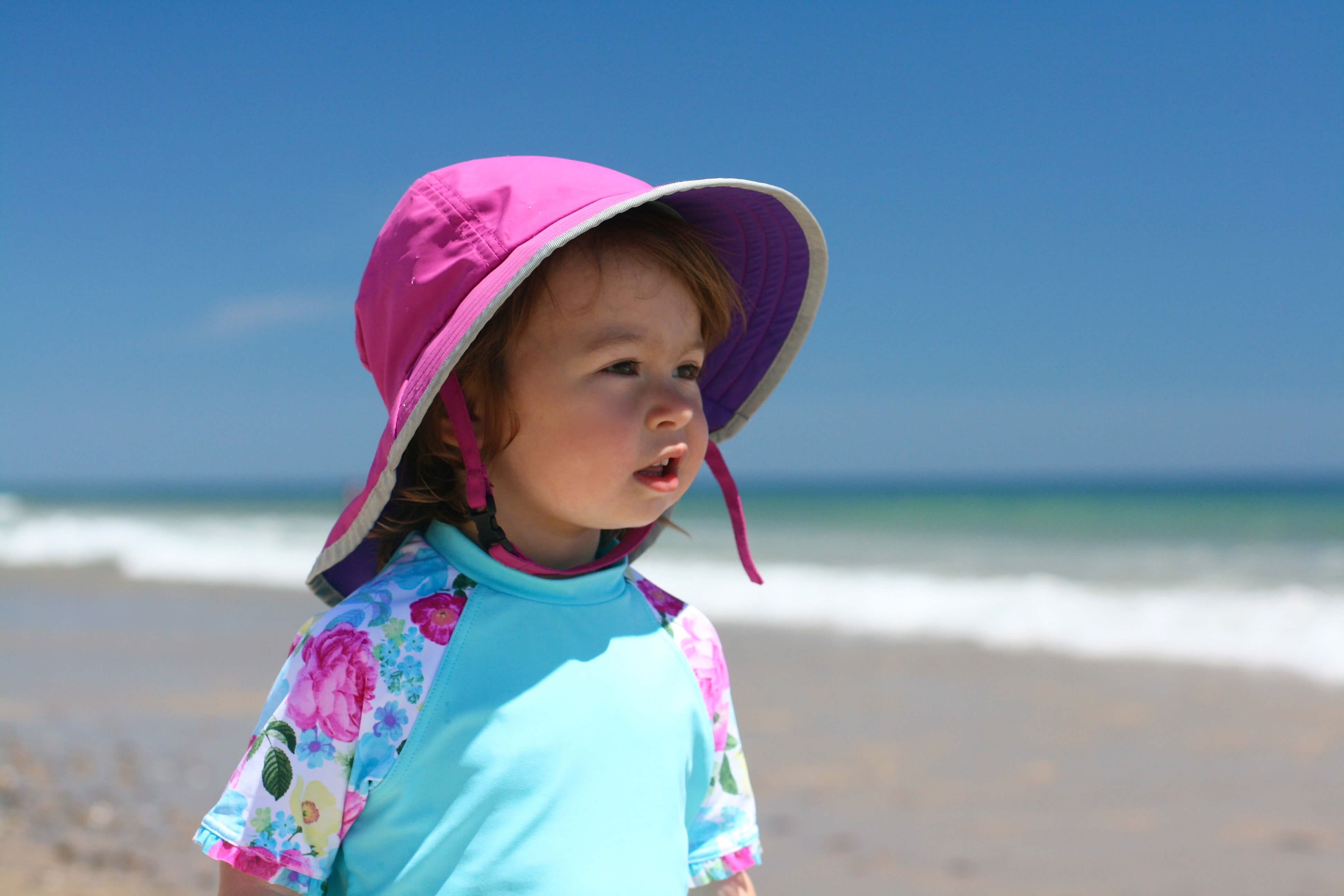Beach Guide with Kids. Tips and Tricks. Sun Protective Hat.