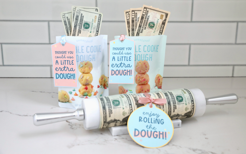 rolling pin covered with money and edible cookie dough with cash and printable gift tag