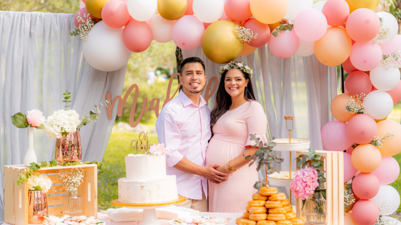 husband and pregnant wife at baby shower